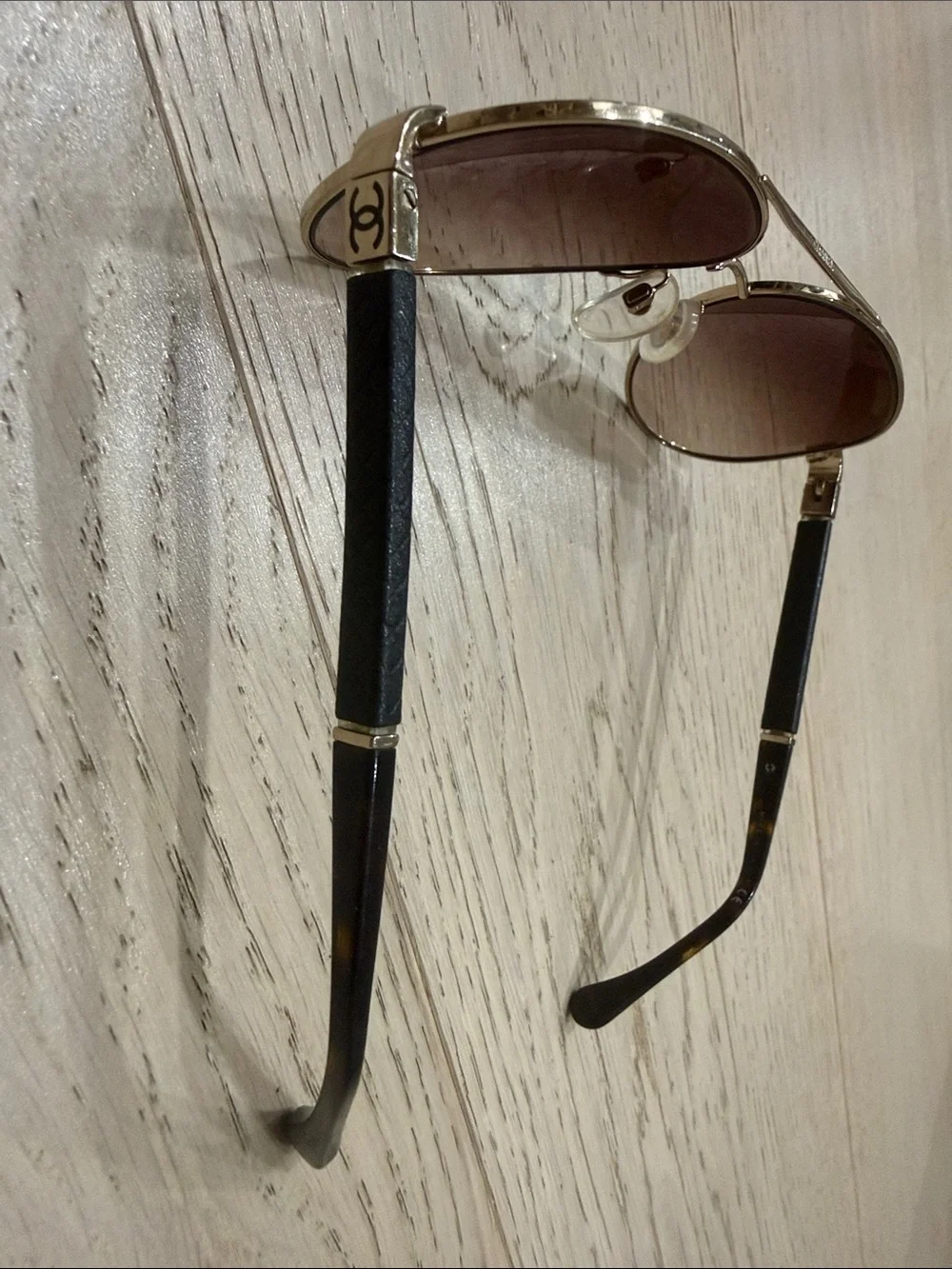 CHANEL Gold Frame Brown Lens Aviator Sunglasses with Black Temple Tips
